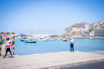 Old man looking to Laginha beach in Mindelo city in Sao Vicente Island in Cape Verde