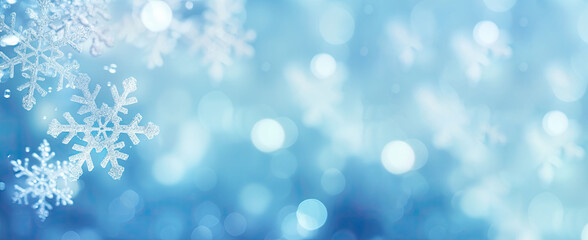 Fototapeta na wymiar Snowflakes on blue bokeh background. Christmas and New Year concept