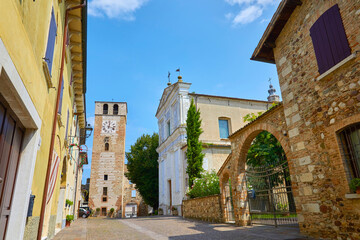 Beautiful view of the city gate in the historic centre of Castellaro Lagusello, Monzambano, Lombardy, Italy.