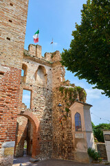 Beautiful view of the city gate in the historic centre of Castellaro Lagusello, Monzambano, Lombardy, Italy.
