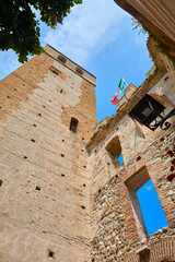Beautiful view of the city gate in the historic centre of Castellaro Lagusello, Monzambano, Lombardy, Italy.