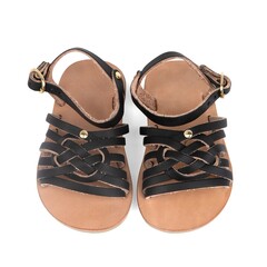Cute and trendy handmade leather baby sandals on white background