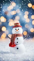 Snowman with red scarf and hat on bokeh background.