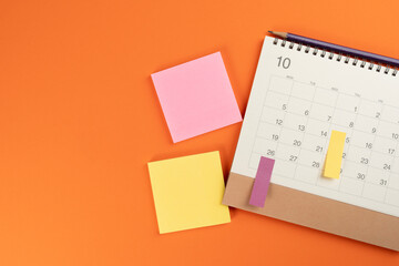 close up of calendar on the colorful table background, planning for business meeting or travel...