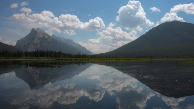 Mount Rundle reflection in the Vermillion Lake near Banff, Canada. Timelapse. 