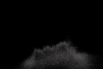 Explosion metallic black glitter sparkle. Dark Glitter powder spark blink celebrate, blur foil explode in air, fly throw black glitters particle. Black background isolated, selective focus Blur bokeh - obrazy, fototapety, plakaty