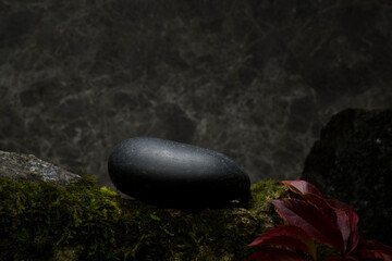 stones on a dark background for the podium