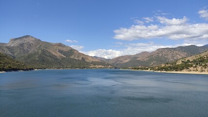 river between mountains and rocks