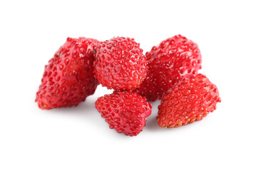 Ripe red wild strawberries isolated on white