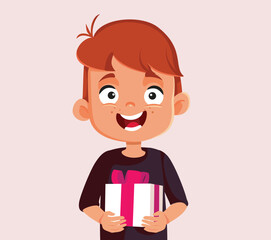 Little Boy Holding a Christmas Present Vector Cartoon Character. Cheerful child enjoying winter holidays receiving gifts 
