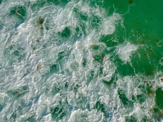 a body of water with rocks