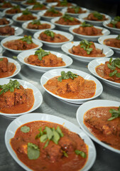 Rows of curry meat at dinner party catering event