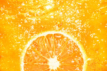 lemon orange slice drop on water soda