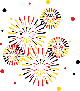 Yellow red and black fireworks, illustrating the colors of the German flag. Fireworks celebrate the holidays. Fireworks isolated on white background.