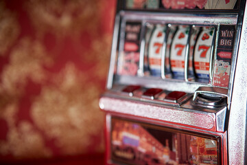 Slot Machine games with a jackpot three seven in a casino,  one-armed bandit.