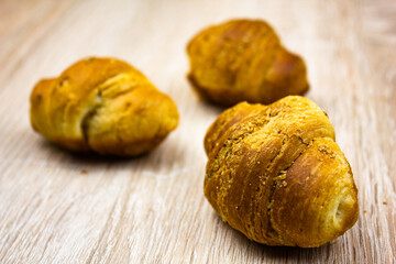 Croissant on the table. Croissant, fresh bun, pastry.