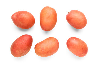 Many fresh raw potatoes on white background