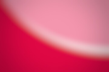 Abstract blurred background image of red color gradient used as an illustration. Designing posters or advertisements.