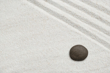 Top view, of stones placed on sand, concept japanese zen garden stone balance - obrazy, fototapety, plakaty