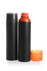 Bottles of shaving foam isolated on white background