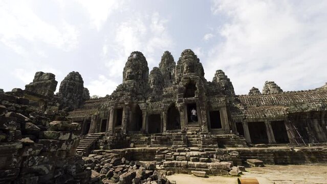 Cinematic gimbal shot of Angkor Thom archaeological site in Cambodia