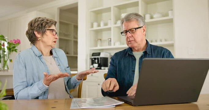 Debt, laptop and senior couple doing budget or finance planning in a home for retirement and frustrated by paperwork. Document, crisis and angry elderly people fight for expenses and fail together