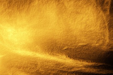 A dusty grunge background with a small grain mix with a beautiful pattern gradient of golden yellow-orange tones.