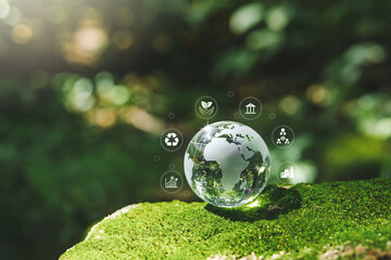 Crystal earth ESG concept ,Sustainable development goal (SDGs) Ideas Globe Glass on green Moss in...