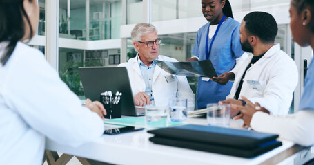 Fototapeta premium Meeting, xray and team of doctors, nurses and people in healthcare research, results and analysis or solution. Senior expert, mentor and group for medical exam, talking and planning or anatomy advice