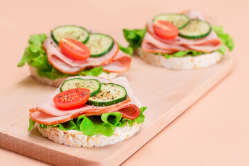 Light Breakfast. Quick and Healthy Sandwiches. Rice Cakes with Ham, Tomato, Fresh Cucumber and...