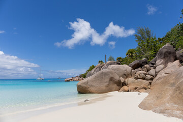 Anze Lazio, Praslin Island, Seychelles, and the typical granite stones. Tropical paradise, crystal clear tranquil waters, white sand, paradise on earth. Vacation mood, relaxation, serendipity.