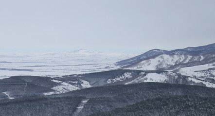 Panorama of mountains and forest in winter