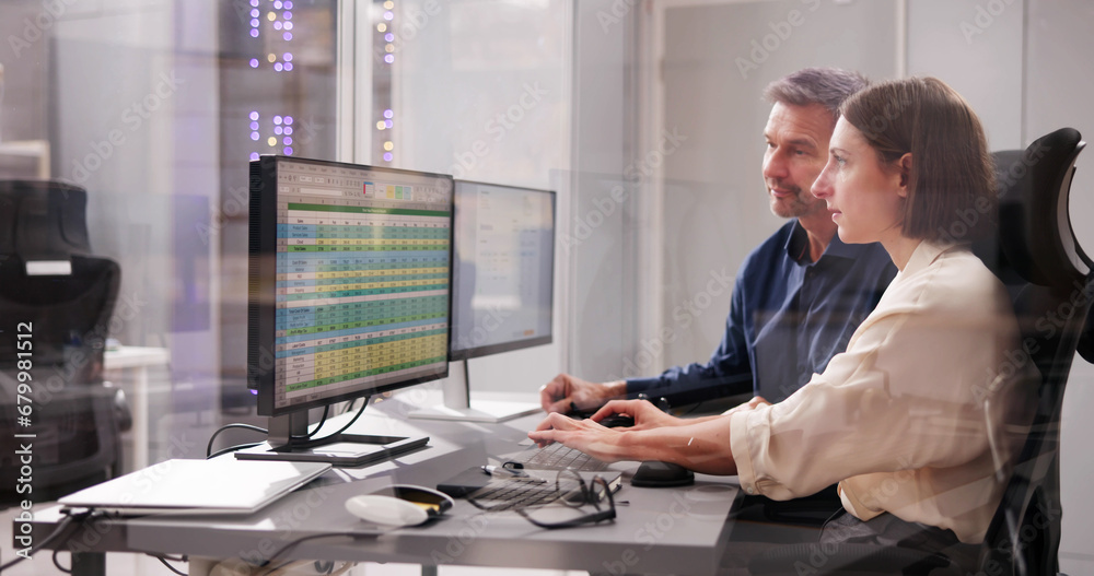 Poster Working Analyst on Desktop Computer