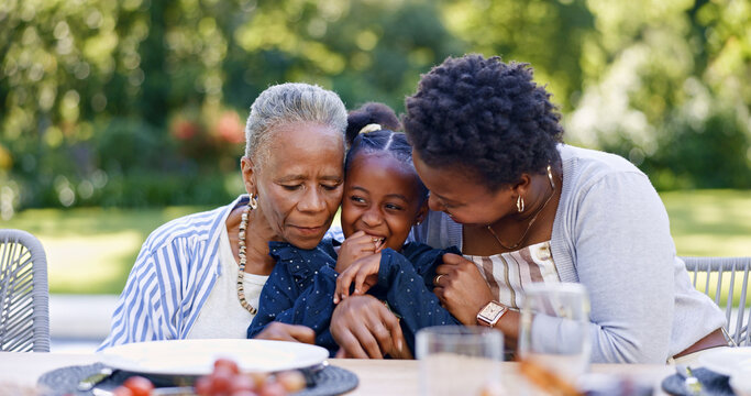 Grandmother, mother and daughter for hug in garden, smile and lunch for relax together with love. Black people, women and child as happy family, gratitude and care bonding for brunch table in park