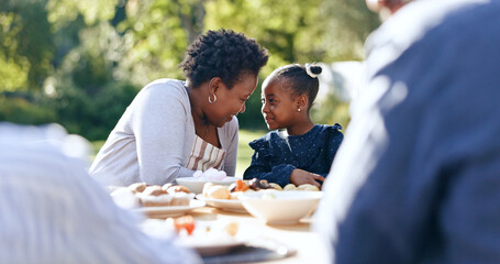Smile, mother or daughter with lunch in garden, food or nature relax for vacation together with love. Black people, woman or child as happy family, reunion and care bonding for brunch table in park - obrazy, fototapety, plakaty
