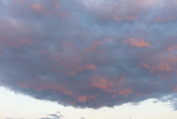 Colorful clouds on the blue sky at sunset