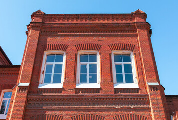 Obraz premium Stained glass window in an old brick house