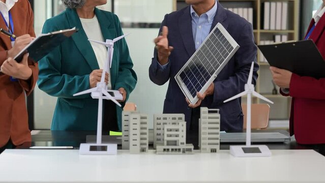 Business leaders took part in high-stakes presentations at the conference discussing installation sites for installing wind turbines or solar cells on homes for sustainable energy.