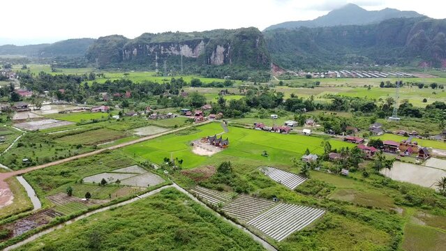 Harau, West Sumatra, Indonesia - View of the village and forest between two rocky hills in the Harau Valley. photographed using a drone.