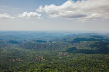Fototapeta premium Beautiful landscape on top of mountain green forest and sky cliffs