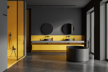 Gray and yellow bathroom with tub, sinks and shower