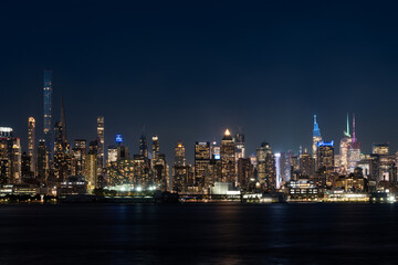 Fototapeta na wymiar New York west side and panoramic view on office buildings at night