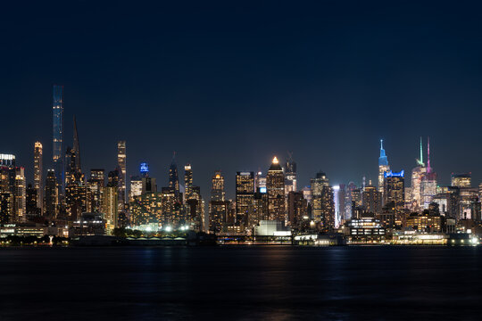 New York west side and panoramic view on office buildings at night © ImageFlow