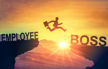 Growth of personal career in business. Silhouette of man jumping from employee to manager....
