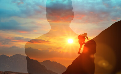 silhouette of businessman climbing mountain and Rear view of businessman standing on top of mountain achieving business goals. double exposure