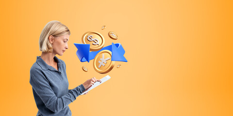 Woman finger touch tablet, yen and dollar gold coins on empty background