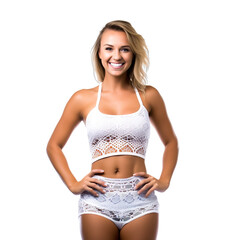 Front view mid body shot of an extremely beautiful Caucasian female model in a white lacey sexy two-piece swimsuit smiling, isolated on a white background