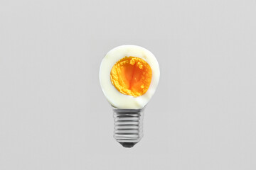 creative composition. light bulb egg on black background, creative concept