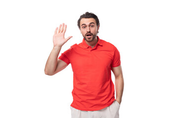 young confused man with black hair and beard dressed in a red t-shirt with an identity mockup on a white background with copy space