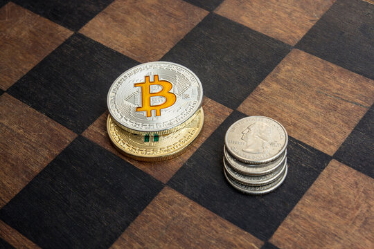 Bitcoins and American cents on a chessboard.